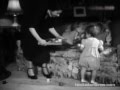 Young Queen Elizabeth plays with toddler Prince Charle