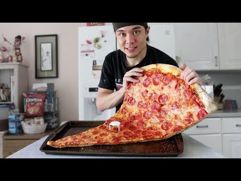 Dude Eats Huge Slice Of Pizza!