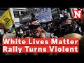 Watch rival demonstrators clash during white lives matter rally in huntington beach