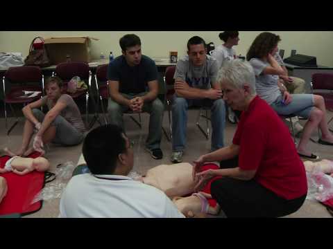 Saint Louis University med students learn Red Cross CPR