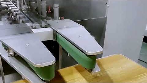 high speed medical bottles feeding cartoning machine with continuous robot feeding boxes system