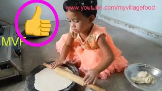 baby making chapati roti