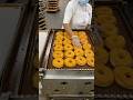 How Carl’s Donuts in Las Vegas glazes fresh CHOCOLATE DONUTS