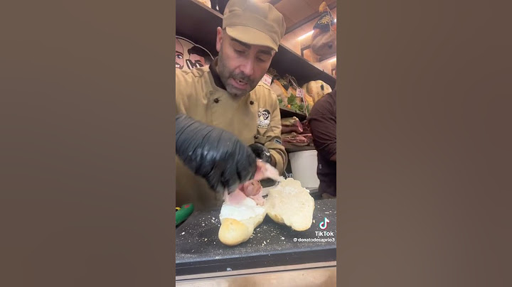 DONATO DE CAPRIO(CON MOLLICA O SENZA)PREPARA UN PANINO MOLLICATO CON BURRATINA E PORCHETTA.