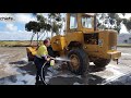 Cleaning Earth Moving Gear