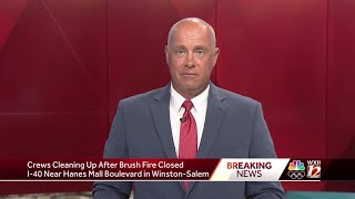 Winston-Salem firefighters control brush fire on Interstate 40, lanes back open