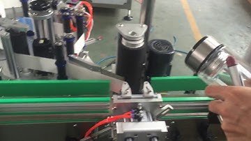 Fix position labeling machine for round bottle