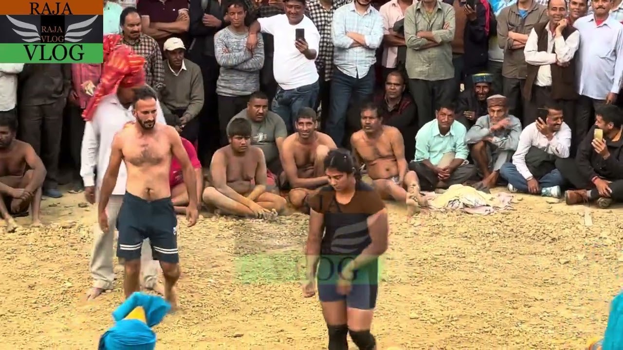 A girl Wrestler defeated a man wrestler.. लड़की ने हराया पुरुष पहलवान को ।