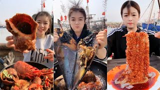 Female fishermen eat conch, scallops, octopus, lobster, squid today #yummy #eatingshow #seafoodboil