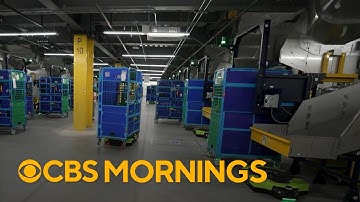 Amazon is using robots to speed up deliveries. How will it impact jobs?