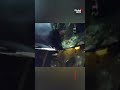 Police bodycam footage captures moment woman rescued from burning vehicle