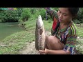 Primitive technology - Skills fishing big at the river and Cooking fish Eating delicious