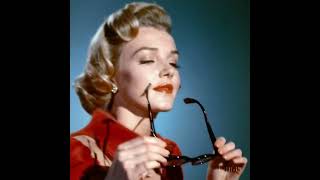 Marilyn Monroe's Vintage Glamour: Trying on Chic Eyeglasses (1953)