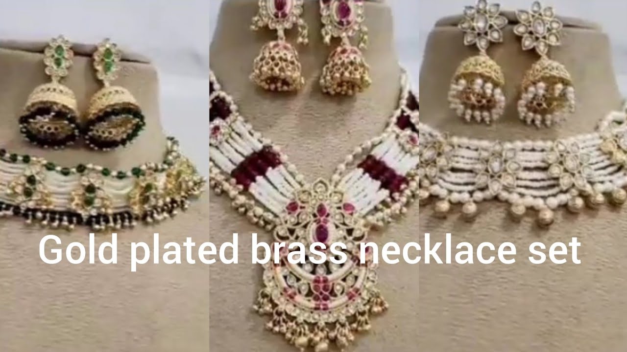 Gold plated brass necklace set. Hami jewels and clutch 