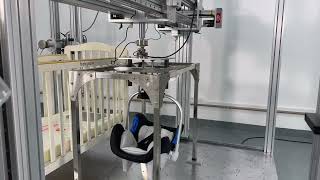 The infant carrier test setup is configured for installation on an integrated test frame