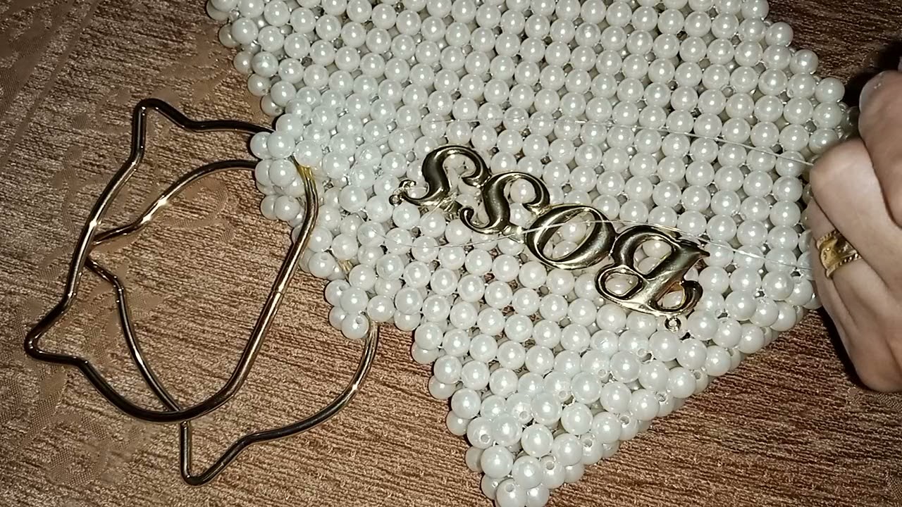 طريقه تركيب اليد والكبسونه للشنطه السواريه الخرز اللولى