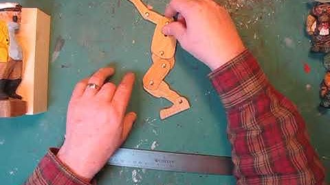 Carving the caricature figure with hand tools 1