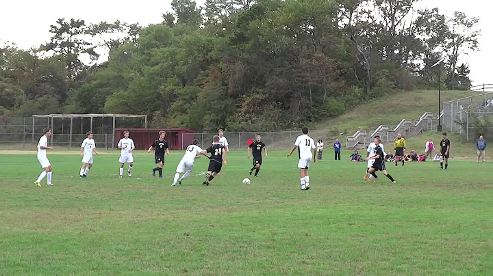 Tom Ruscitti makes a diving save on a one-timed shot by Sam Monaco