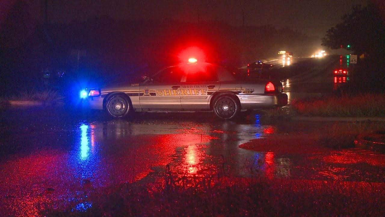 High water covers the roadway on Howard Lane