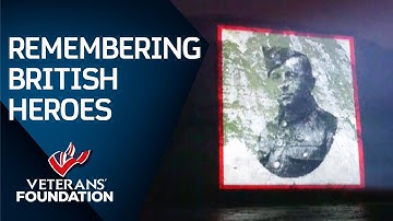Watch faces of lost British Veterans projected onto Cliffs of Dover