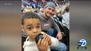 Hero hockey fan blocks puck from hitting 4yearold boy