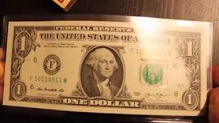 Super find.  Rare binary 1's and 0's fancy Dollar $1 Serial number