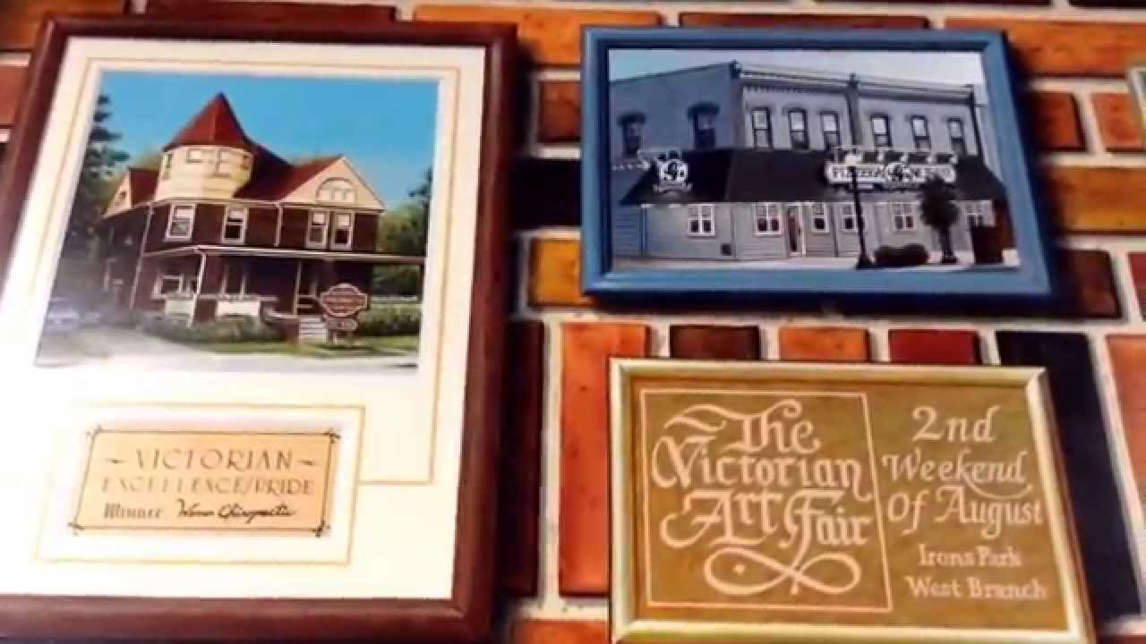 Tanger Outlet Mall mural by Dave Wiley in West Branch, Michigan I75