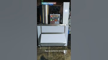 Ice flake making machine and ice storage bin.