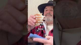Bacon must be cooked in the woods when it snows #campstove #tarpshelter #breakfast