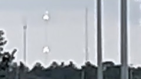 Cursed New LED Lights on Red and white tower Daytime