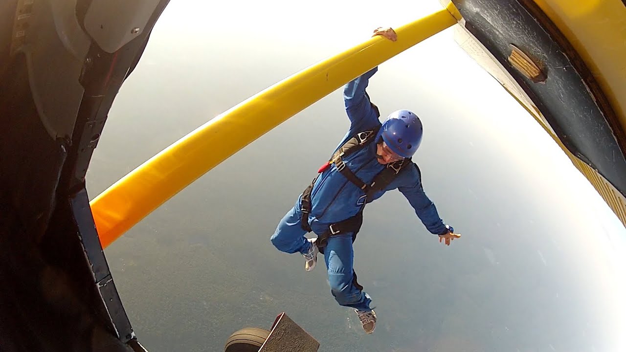 Fun Cessna skydive Exits (GOPRO) Hanging from Wing of ... Skydivers generally don't do that.