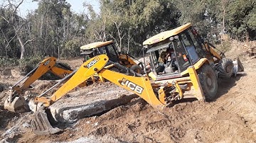Two JCB Backhoe Trying To Throw Out Bridge Slab - JCB Video