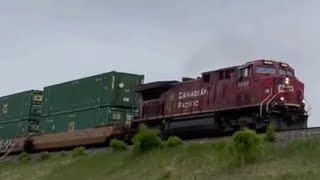 CP stack train with one ES44AC rumble unit in middle approaching Ogden yard on the Brooks Sub.