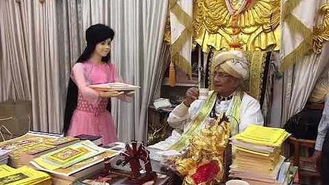 Sharanabasappa appa brought lady Robert to serve tea in office