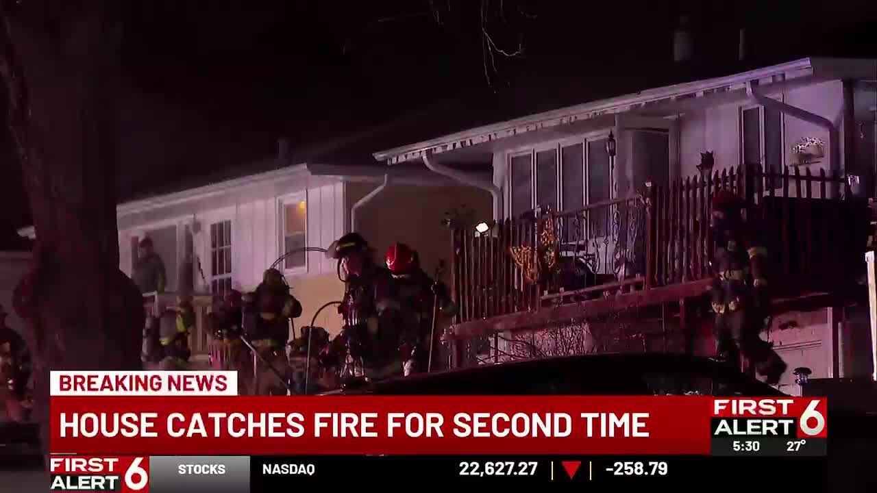 Crews return to South Omaha home after fire rekindles overnight - YouTube