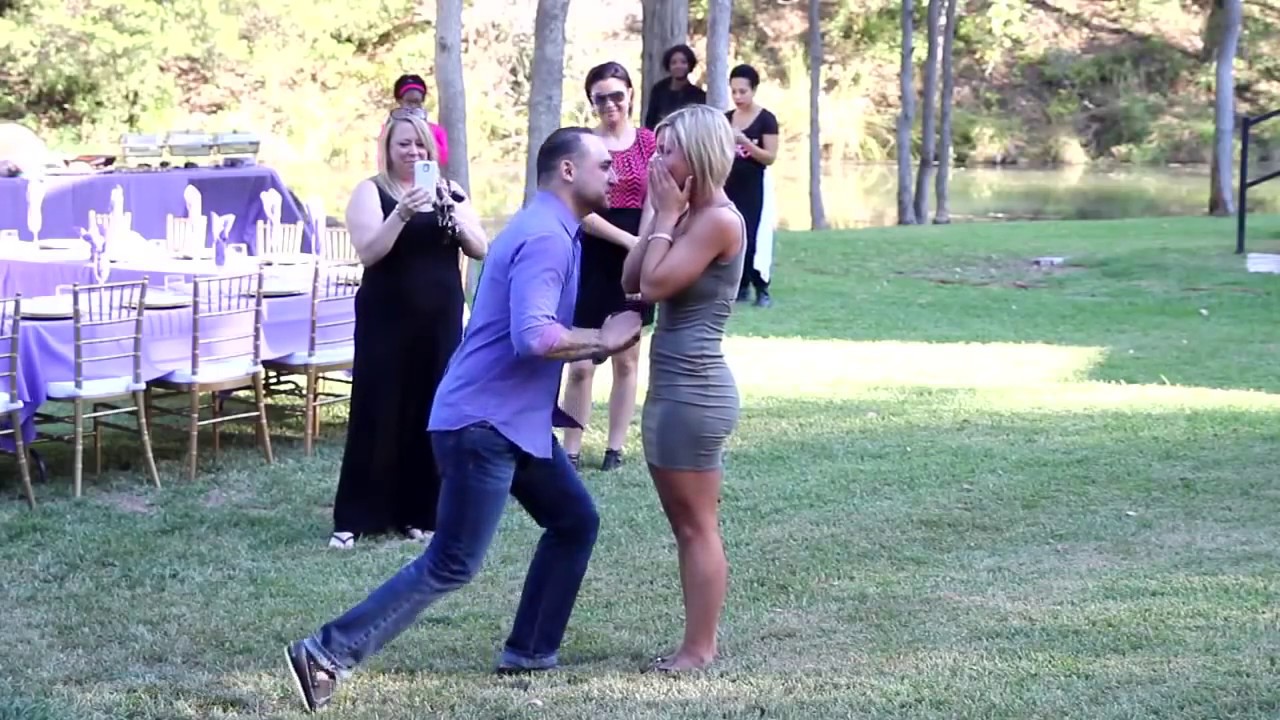 He set up a surprise proposal and invited all her friends and family