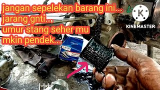 Penyebab Suzuki smash Titan asap putih dan boros busi akibat filter oli yg tersumbt