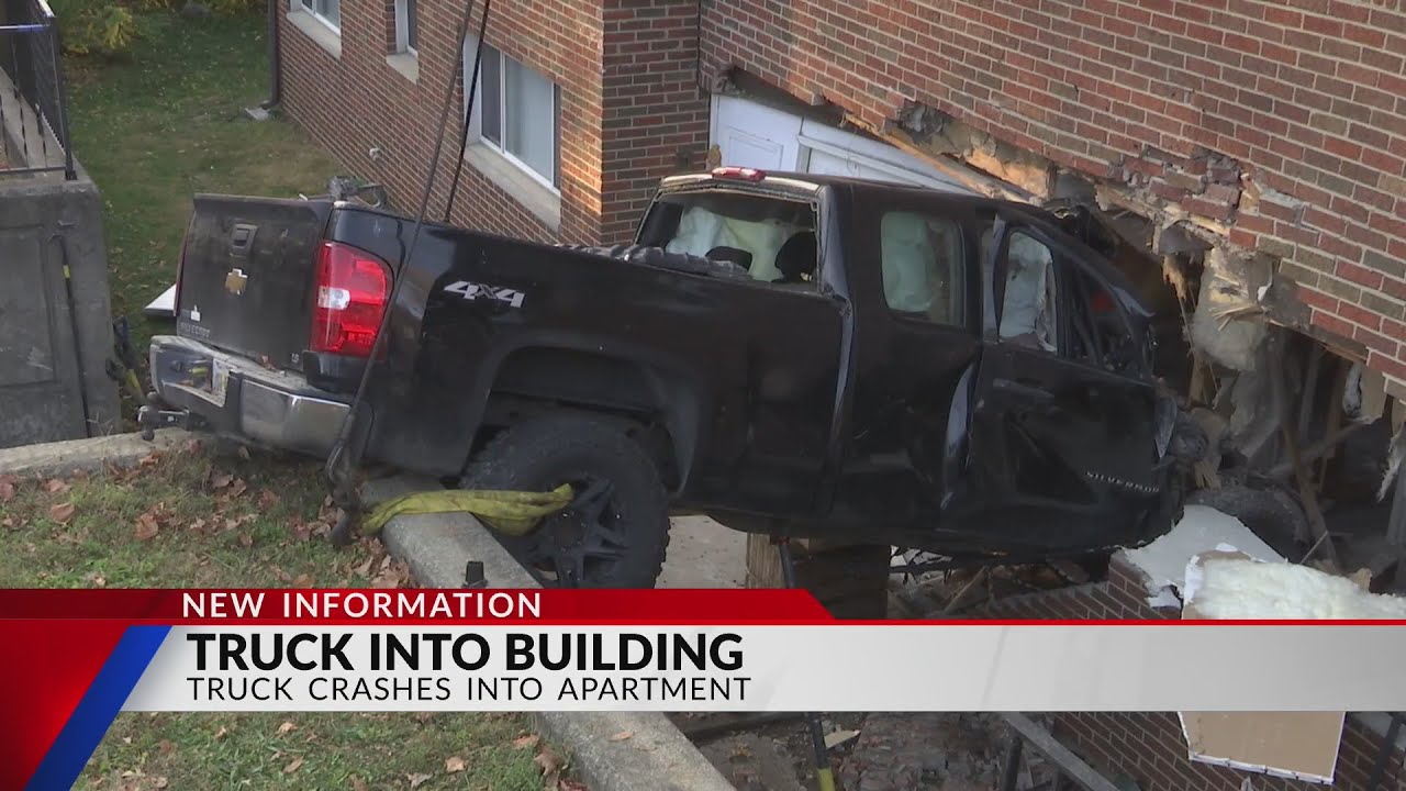 20 displaced after truck crashes into apartment - YouTube