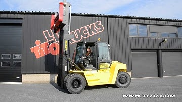 tito.com // Girl driving a Hyster H360HD2 and tilting the mast forward and backward