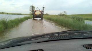 Sprayer driving thru water