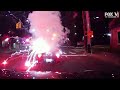 Lit firework tossed into convertible by passing vehicle on july 4