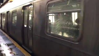 Slo-Motion N Train during sunset rainstorm