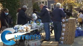 Free Turkeys For Families: People Line Up for Catholic Charities Giveaway