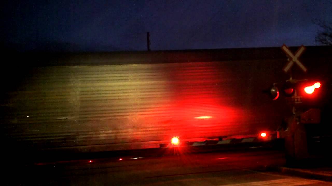 Night Shot/CP 242 w/ CP 8792 & KCS 4864 hooked E.S. lead this EB mixed/Autorack train thru