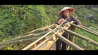 building a new house with bamboo with many people, Ly Thi Ba.