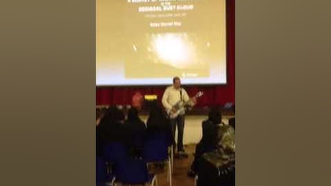 Dr Mark Lewney Performing Bohemian Rhapsody