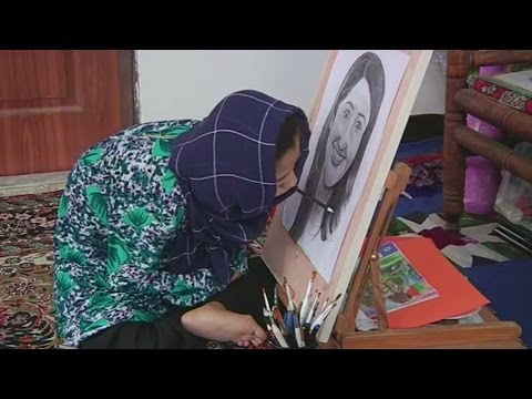 Disabled Afghan teenager draws incredible portraits with her mouth