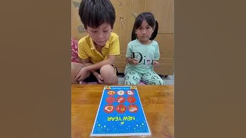 Tiếng Anh Giao Tiếp Trẻ Em Tại Phan Thiết: Eric and Tracy practice talking about Tet Holiday