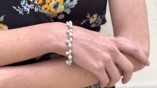 Vidéo: Bracelet en or gris 18 Cts avec perles de culture et diamants brillants. 16,5 cm