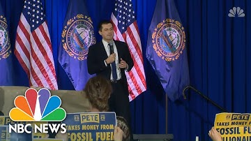 Singing Protesters Interrupt Pete Buttigieg At New Hampshire Town Hall | NBC News